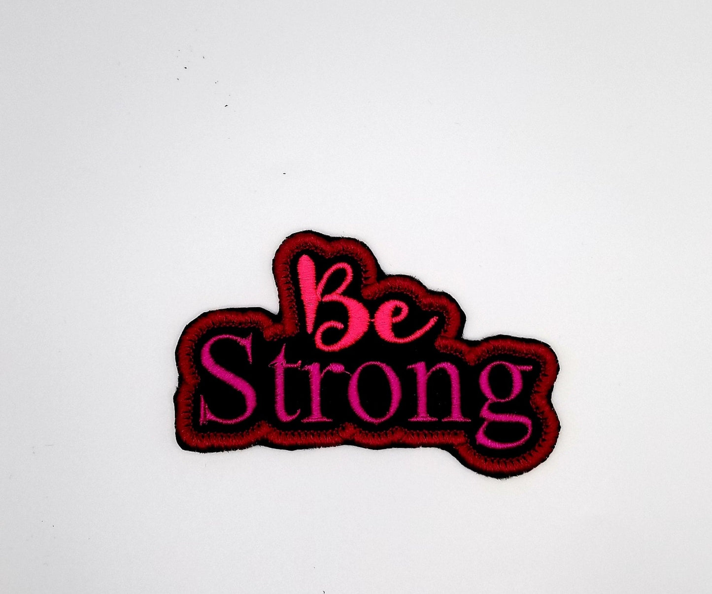 Be Strong Sew on Embroidery Patch, wit adhesive backing for placement. Pinks and Dark Red Color 6.98