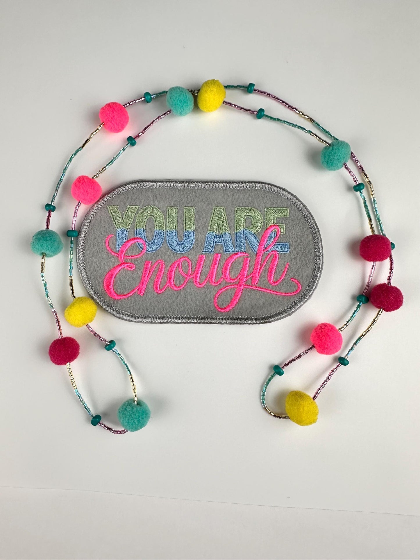 You are ENOUGH Embroidery Patch. Oval with gray background. This is a Sew On Patch with adhesive packing says it All. 7.83