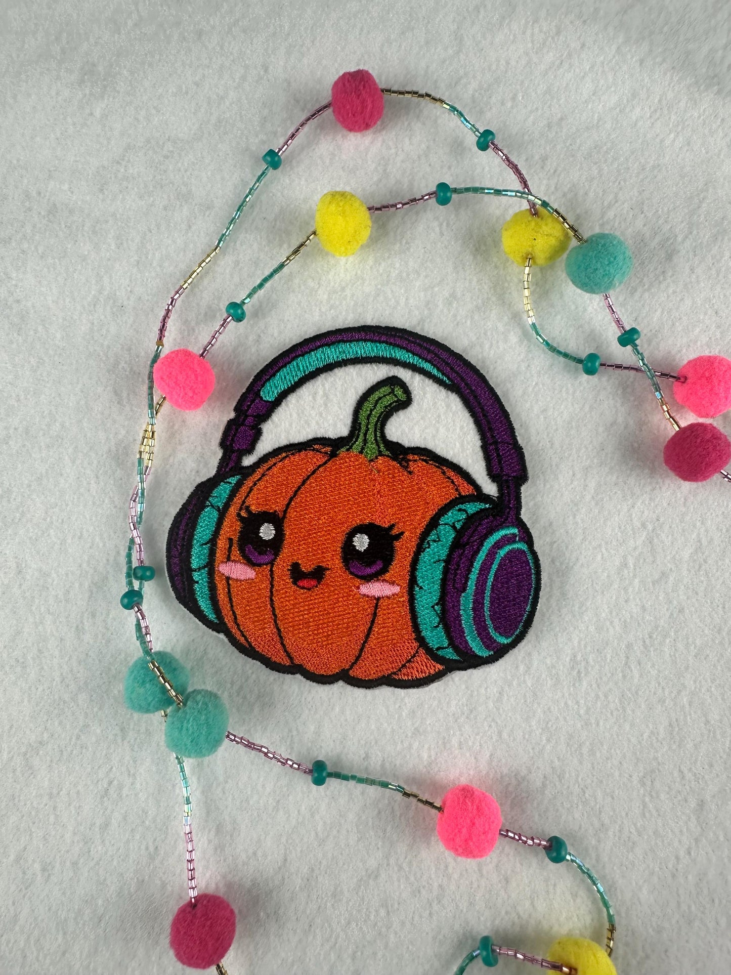 Cute Pumpkin with Headphones Embroidery Patch-Smiling Halloween Patch with music headphones and cute smile. 6.33