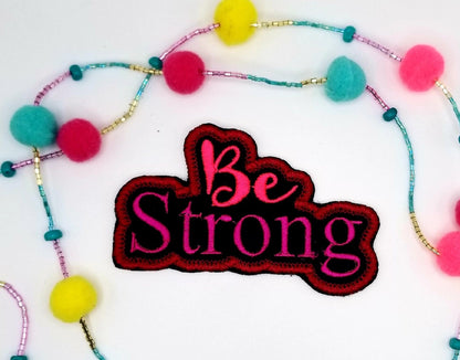 Be Strong Sew on Embroidery Patch, wit adhesive backing for placement. Pinks and Dark Red Color 6.98