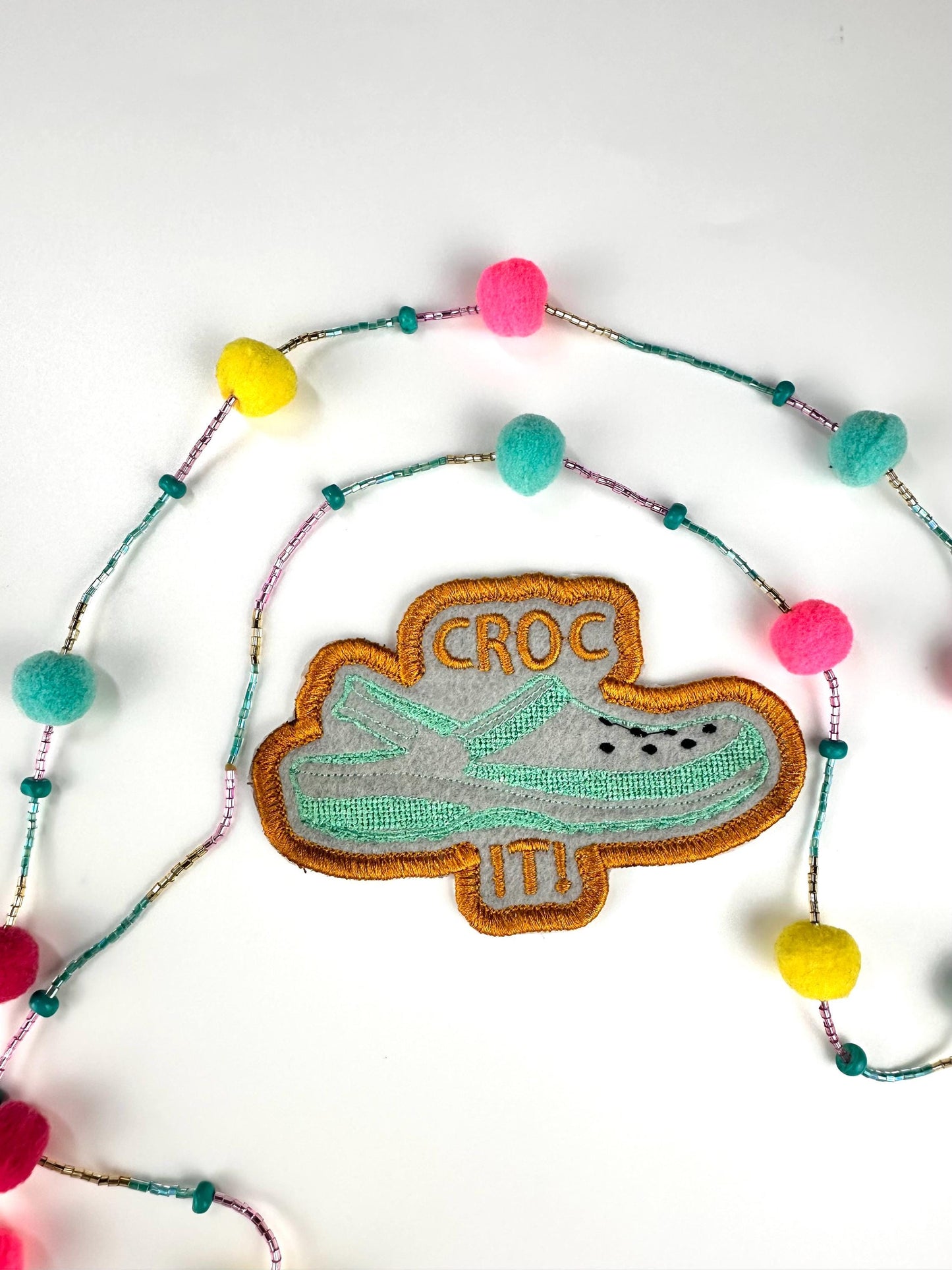 Croc It! Embroidery Patch, Sew on with Iron on adhesive for placement.