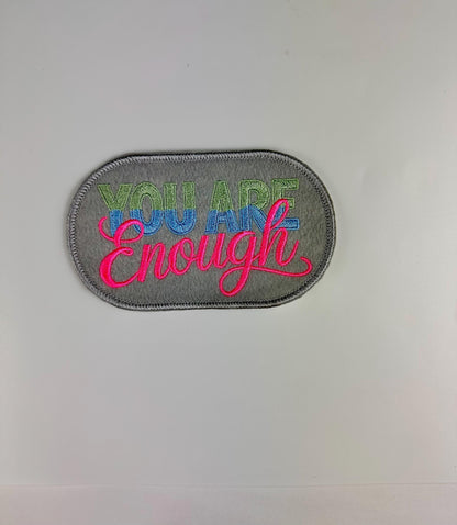You are ENOUGH Embroidery Patch. Oval with gray background. This is a  Sew On Patch with adhesive packing says it All.  7.83