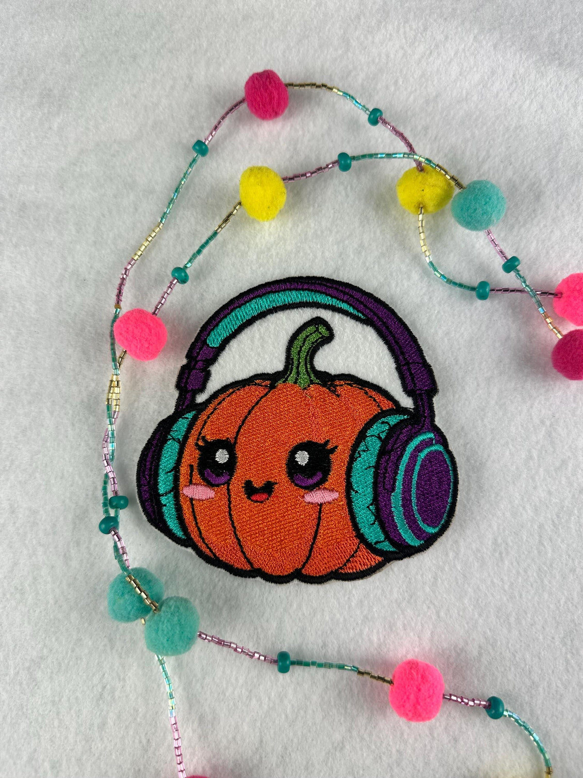 Cute Pumpkin with Headphones Embroidery Patch-Smiling Halloween Patch with music headphones and cute smile. 6.33