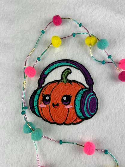 Cute Pumpkin with Headphones Embroidery Patch-Smiling Halloween Patch with music headphones and cute smile. 6.33