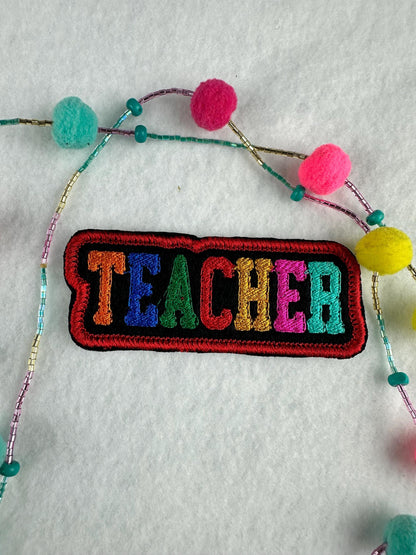 TEACHER Embroidery Patch – Whimsical Colorful Letters with Red Satin Border 6.53