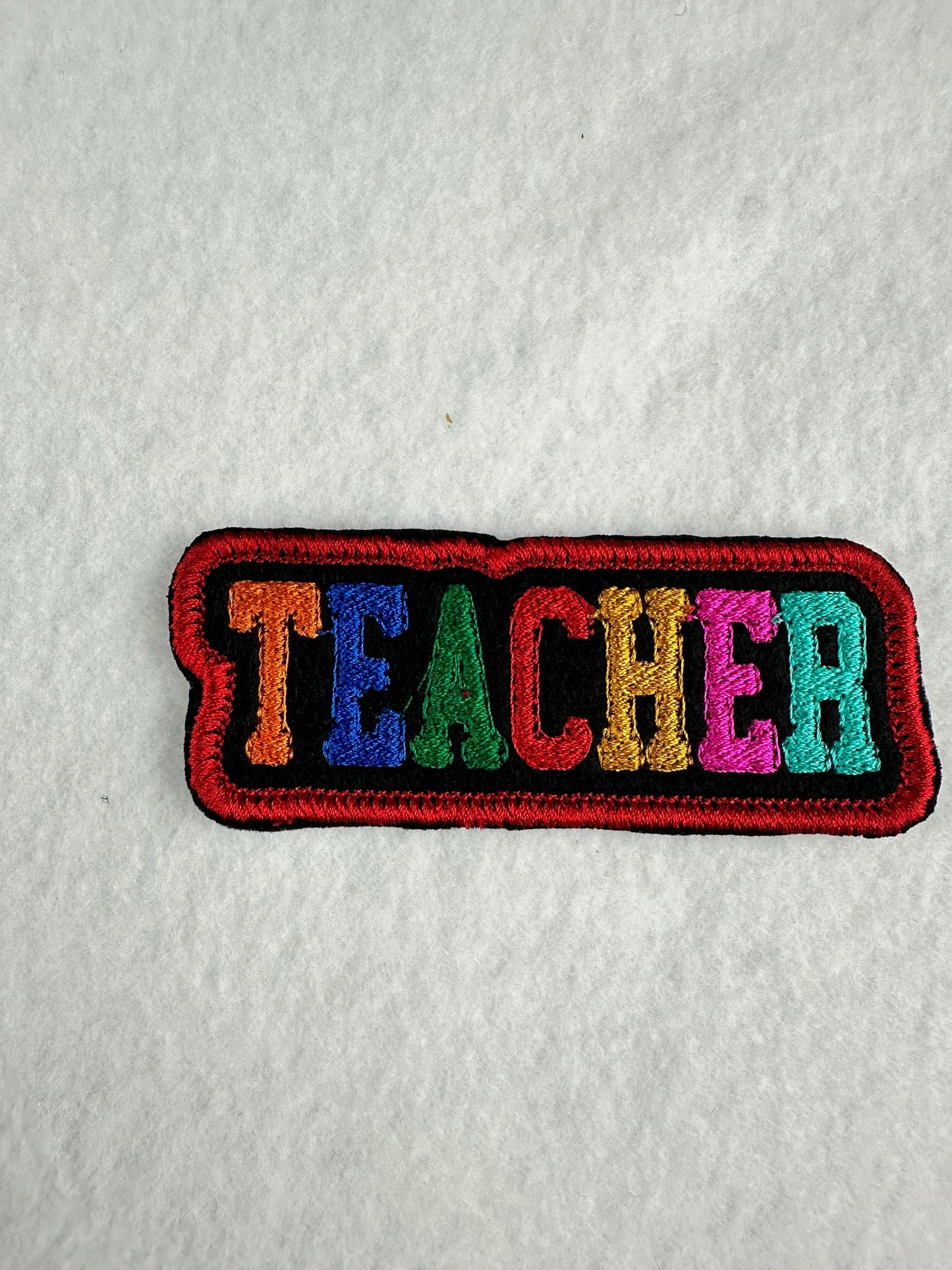 TEACHER Embroidery Patch – Whimsical Colorful Letters with Red Satin Border 6.53