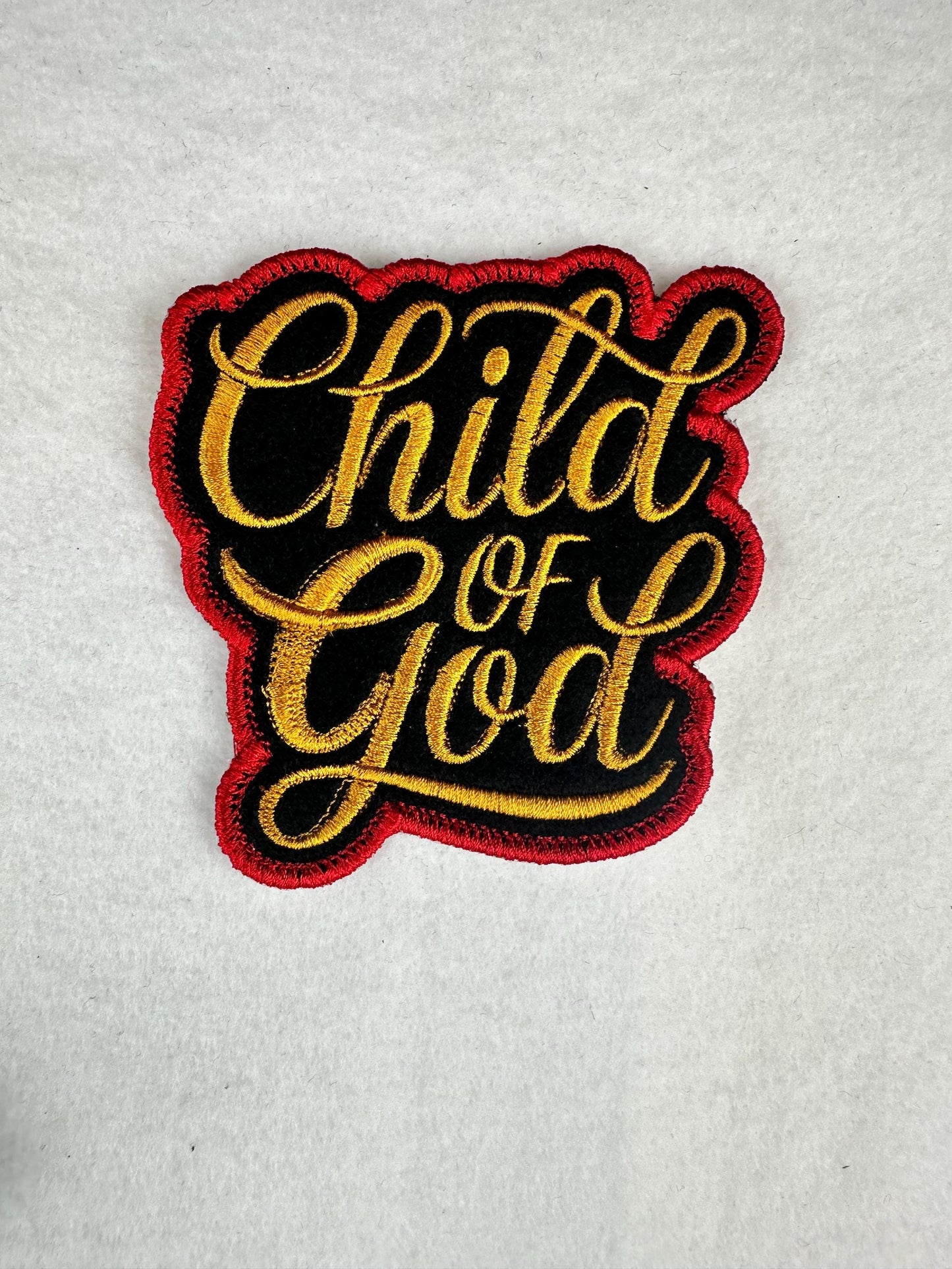 Child of God Embroidery Patch, Gold Lettering on Black with Red Border, Christian Sew On Patch with Adhesive for Placement, Jackets & Bags