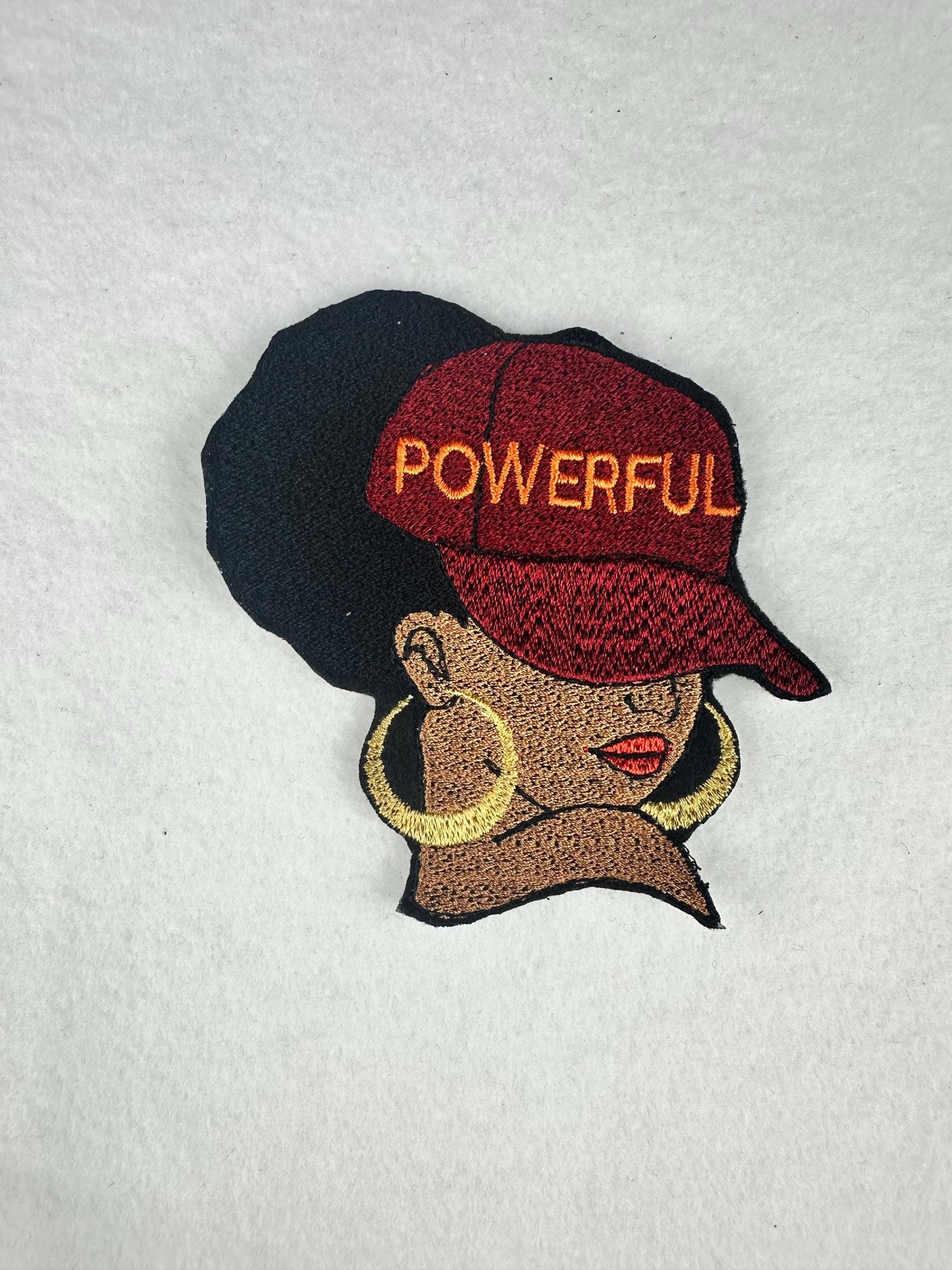 Afro Woman “POWERFUL” Embroidery Patch, 3D Black Woman Patch in Burgundy Cap with Gold Earrings, 3.75" Sew On Patch for Jackets & Bags